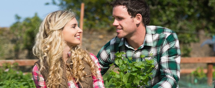 Happy couple gardening together