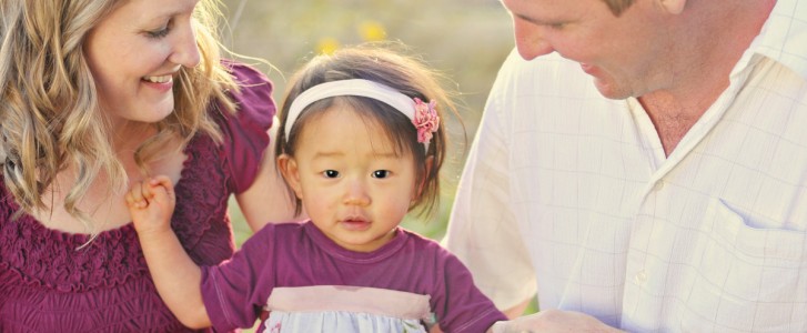 Husband, wife and adopted daughter