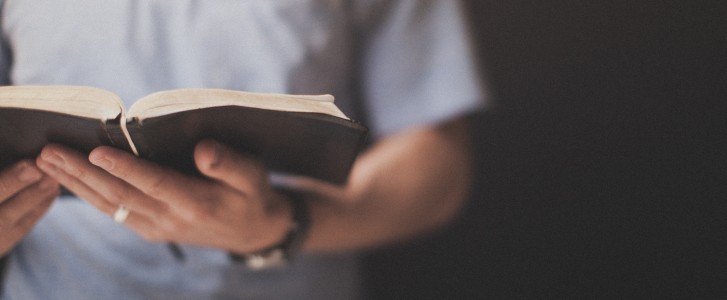 Man holding Bible