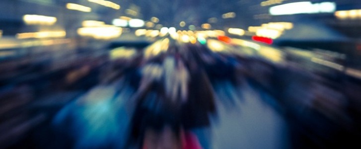 Action shot of busy city street at dusk