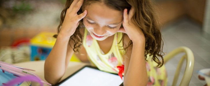 Young girl using an iPad