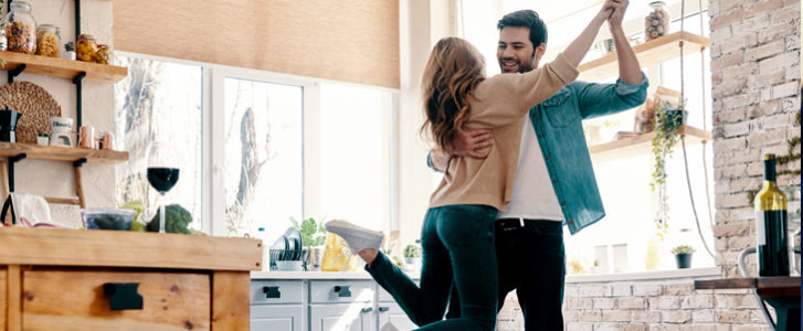 Couple dancing in the kitchen