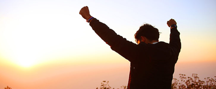 Man with hands raised